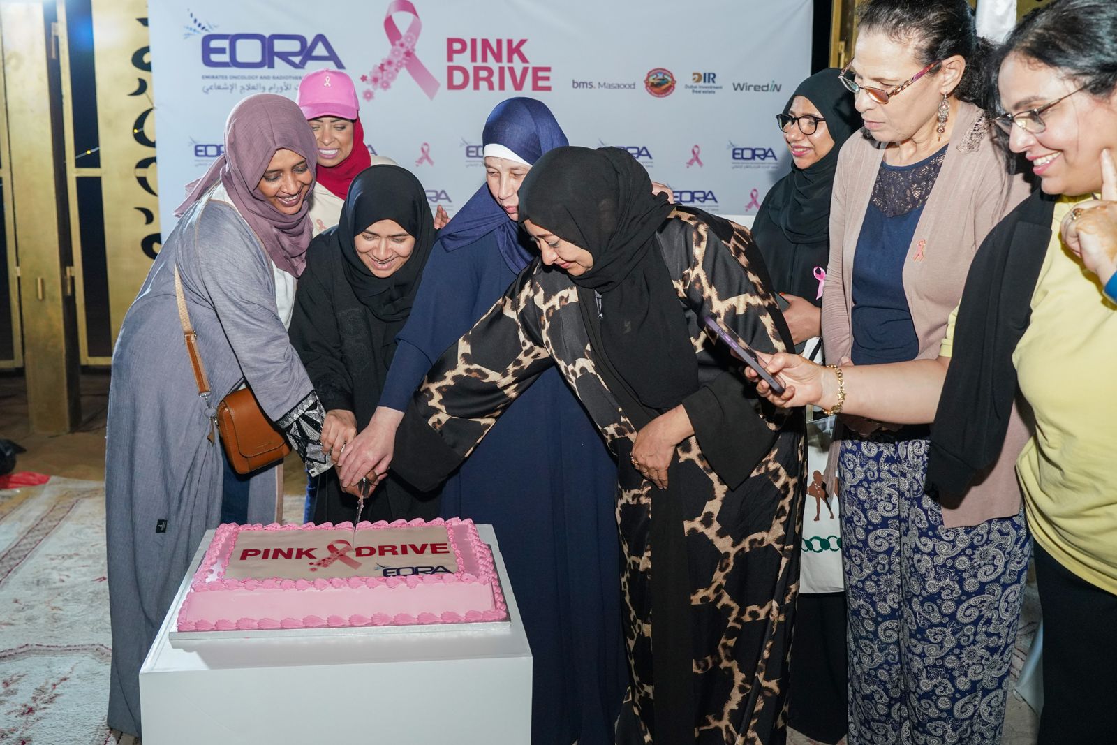 Photograph 15 from EORA's 2025 Annual Pink Drive for breast cancer awareness