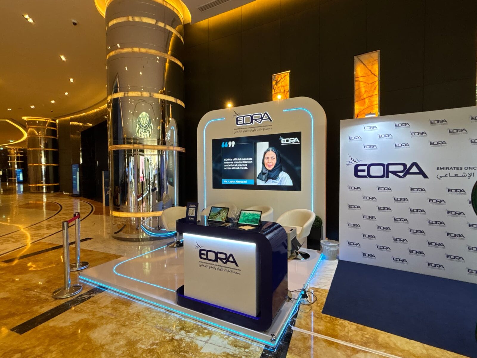 The EORA exhibition stand in the conference foyer at the Emirates Oncology Conference, Abu Dhabi 2025