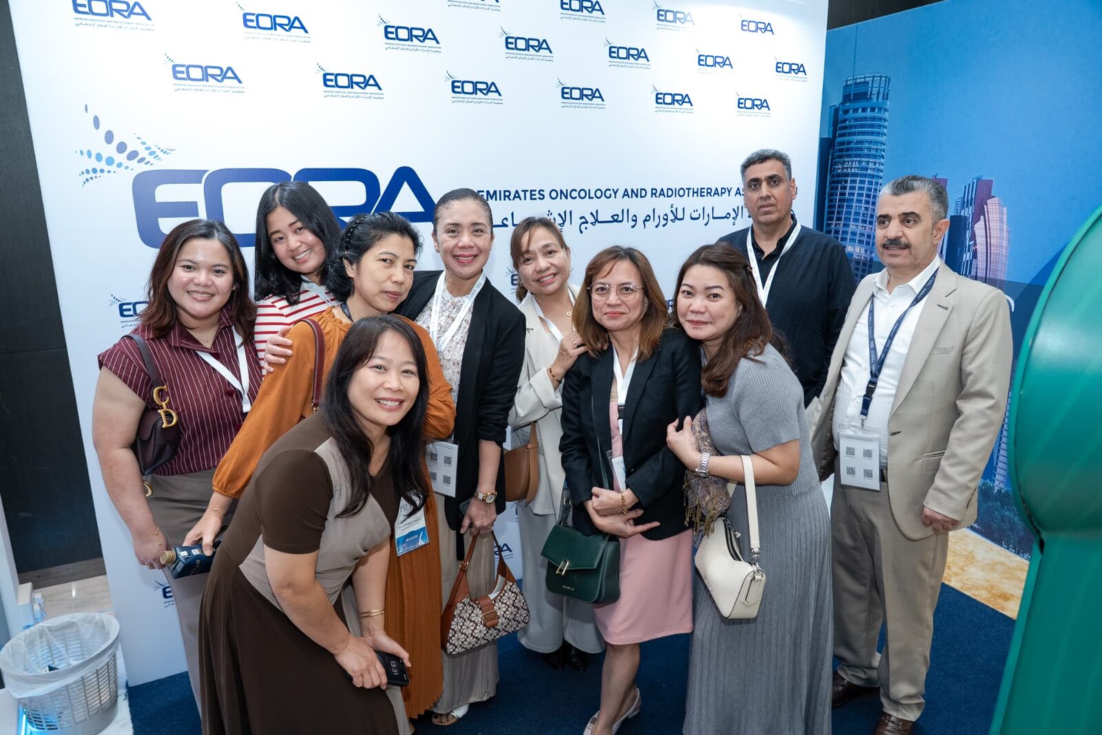 Group of delegates in front of the EORA branded backdrop at the Emirates Oncology Conference, Abu Dhabi 2025